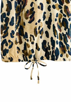 Beżowa tkanina z niebieskim, brązowym i czarnym wzorem w cętki lamparta, z elastycznym dołem i zawiązywanym sznurkiem na środku dolnej krawędzi.