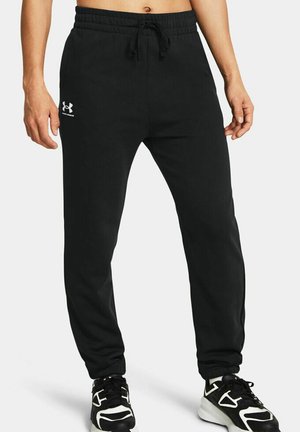 Schwarze sportliche Jogginghosen aus einem weichen Material, mit einem elastischen Taillenbund und Kordelzug sowie einem kleinen weißen Logo an der linken Oberschenkel.