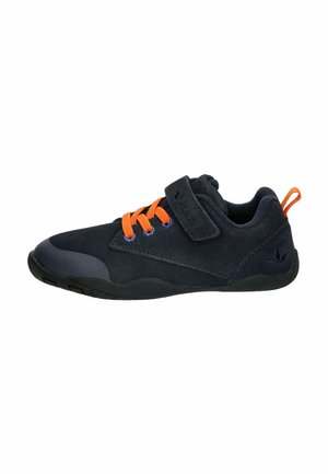 Dark blue suede shoe with orange laces and a Velcro strap. Features a rounded toe, rubber sole, and subtle logo on the side.