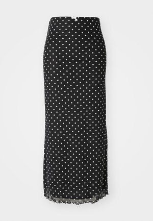 Falda midi negra con lunares blancos, tela suave, ajuste ceñido, dobladillo inferior con onda y cierre con cremallera en la parte posterior.