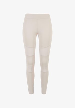 Beezhijad retuusid, mis on valmistatud venivast materjalist ja millel on tekstureeritud aktsendid ning lai vöökoht mugavuse tagamiseks.