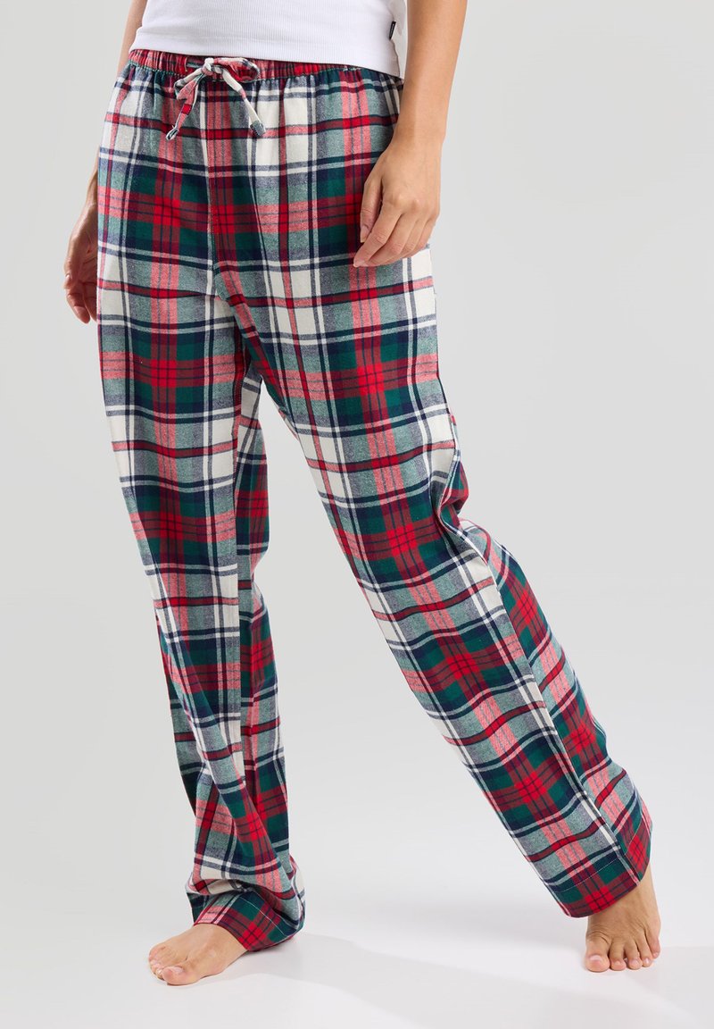 Ruudulliset pyjamahousut, joissa on kiristysnauha vyötäröllä. Valmistettu pehmeästä kankaasta punaisen, vihreän ja valkoisen värikuvion kanssa, joissa on rento istuvuus.