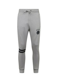 Grijze sweatpants met een trekkoord in de taille, zijzakken, zwart gestreepte accenten en een circulair logo met drie sterren.