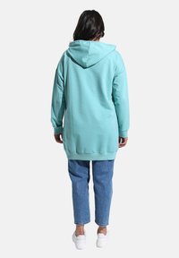 Modanisa Bluza z kapturem