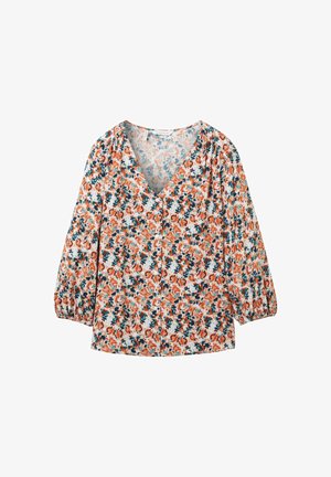 Blomsterbluse med V-hals, lange puffærmer og en hvid baggrund med orange og teal mønstre. Fremstillet af letvægtsstof.