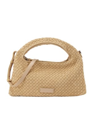 Tan woven handbag with a rounded cut-out handle and an adjustable shoulder strap, featuring a small rectangular logo patch.