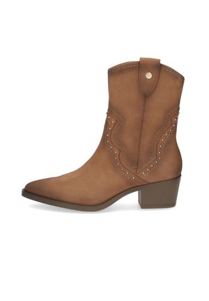 Brown leather ankle boot with pointed toe, decorative stitching, and small studs along the sides. Block heel for added stability.