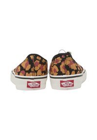Kangasneakers med ett flerfärgat leopardmönster, svarta accenter och vita gummisulor. Har Vans-logotypen på hälen.