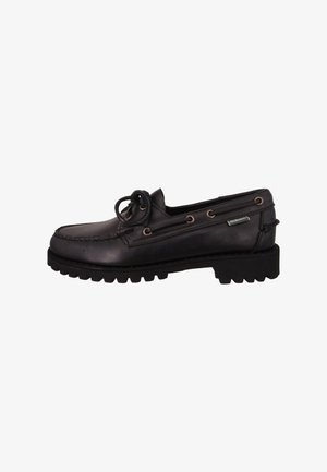 Schwarze Lederbootsschuhe mit einer mokassinförmigen genähten Zehe, Gummisohle, dekorativer Schnürung und Metallösen. Mit einem Markenlabel.