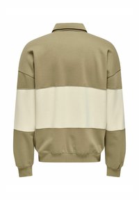 Olive green and cream sweatshirt with a collared neckline, long sleeves, and horizontal color-blocking design. Soft fabric with ribbed cuffs.