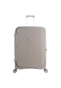 Hard-shell suitcase in light beige, featuring vertical ribbed texture, a retractable handle, four spinner wheels, and logo detail.