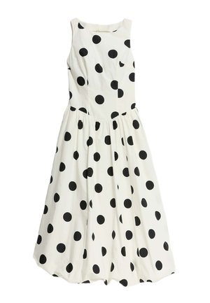 Abito bianco senza maniche con grandi pois neri, corpino aderente e gonna svasata con dettagli arricciati in vita.