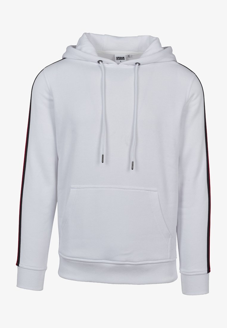 Fehér kapucnis pulóver, elülső zsebbel, húzózsinórral és piros oldalsávokkal. Simaságával és bordázott mandzsettáival tűnik ki.