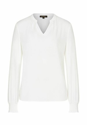 Weiße Bluse mit langen Ärmeln und V-Ausschnitt, weicher Textur und gerafften Manschetten. Enthält subtile Fältchen am Ausschnitt für zusätzliche Details.