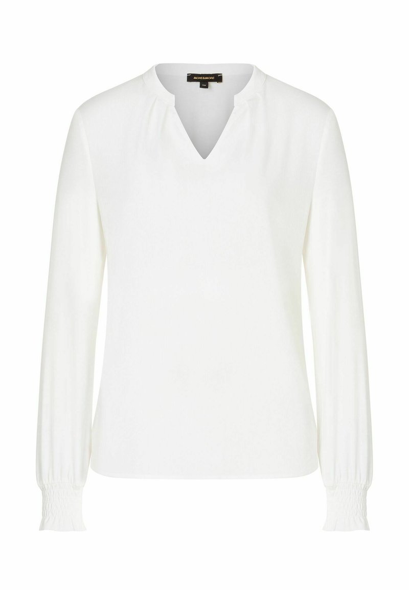 Weiße Bluse mit langen Ärmeln und V-Ausschnitt, weicher Textur und gerafften Manschetten. Enthält subtile Fältchen am Ausschnitt für zusätzliche Details.