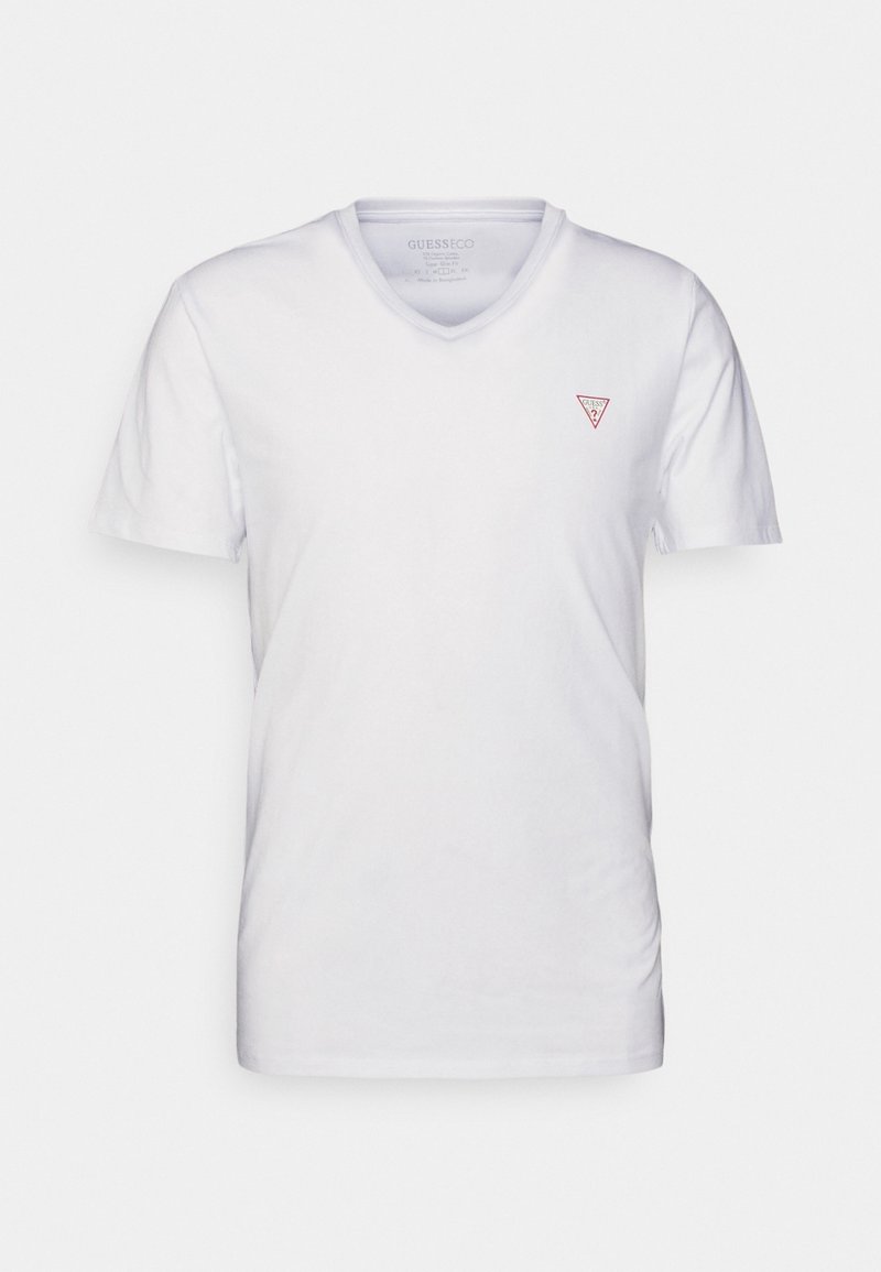 T-shirt en coton blanc avec un col en V, présentant un petit logo triangulaire rouge sur la poitrine gauche. Manches courtes et coupe standard.