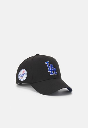 Black baseball cap made of fabric, featuring blue embroidered "LA" logo on the front and a round patch on the side with "Dodgers" text.