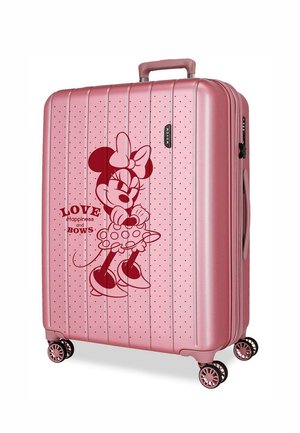 Maleta rígida rosa con gráfico de Minnie Mouse, lunares, cuatro ruedas dobles giratorias y texto "Amor, Felicidad y Lazos" en el frente.