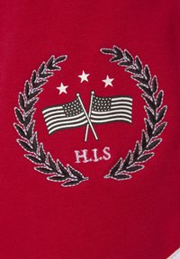 Red fabric features embroidered design with two crossed American flags, five stars above, and laurel leaves surrounding letters "H.L.S."