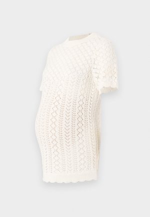 Blusa de maternidade de malha branca com mangas curtas, gola canelada e padrões geométricos em trabalho aberto para respirabilidade e conforto.