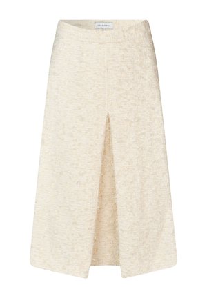 Crème-kleurige rok van een gestructureerde stof, met een split aan de voorkant en een elastische tailleband voor comfort. Etiket zegt "DEA KUDRIAL."