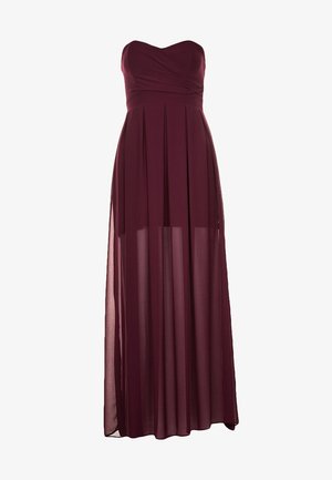 Strapless, floor-length burgundy dress with a fitted bodice and pleated, sheer overlay skirt.