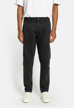 - Jeansy Relaxed Fit