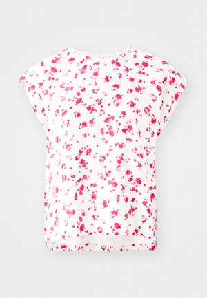 Weißes Oberteil mit floralem Muster in Rosatönen, kurzen Dolmanärmeln und lockerer Passform mit einem runden Halsausschnitt. Strukturierte Stoffdetails.