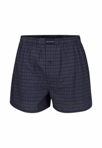 Boxers bleu marine avec un motif à carreaux rouge et blanc. Fabriqués en tissu doux avec une taille élastique et une ouverture à un seul bouton.