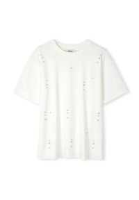T-shirt blanc à manches courtes en coton, avec une texture lisse et des accents en forme de diamant répartis uniformément sur le devant.