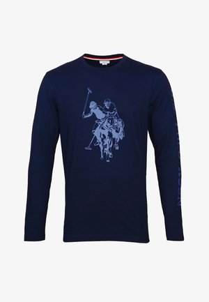 Polo marine à manches longues en coton ; présente un graphique de scène polo bleu clair sur le devant et un texte de logo le long de la manche.