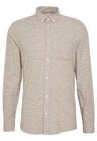 Beige overhemd met lange mouwen, knoopsluiting en button-down kraag, met een borstzakje, gemaakt van gestructureerde stof.