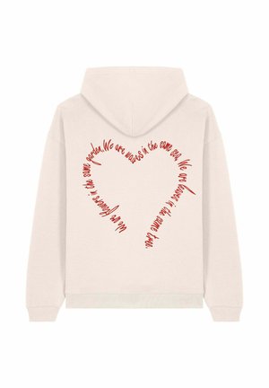 Light beige hoodie with a heart design made of red text on the back, featuring curved phrases that emphasize unity. Made from a soft material.