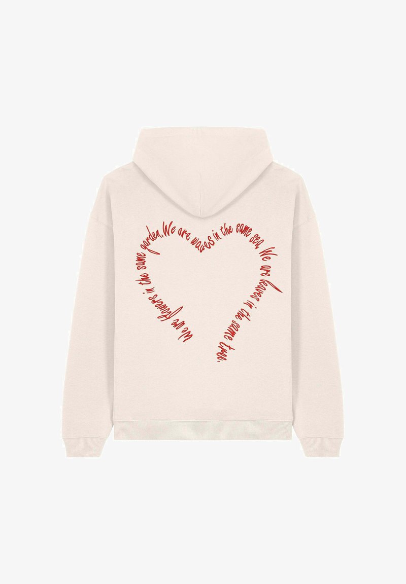 Light beige hoodie with a heart design made of red text on the back, featuring curved phrases that emphasize unity. Made from a soft material.