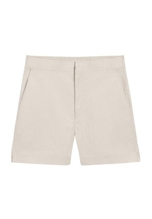 Beige knielange Shorts mit einem elastischen Bund, Seitentaschen und einem minimalen vorderen Nahtdetail.