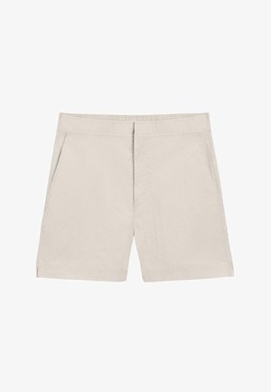 Beige knielange Shorts mit einem elastischen Bund, Seitentaschen und einem minimalen vorderen Nahtdetail.