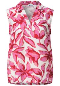 Blusa sin mangas con escote en V, con un estampado floral llamativo en rojo, rosa y púrpura sobre tela blanca.