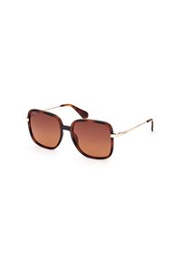 Gafas de sol de gran tamaño en carey con lentes de tono marrón degradado, acentos de metal y patillas doradas finas.