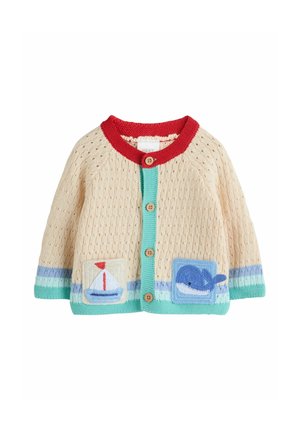Cream knitted cardigan with red collar, turquoise button placket, two appliqué patches of a sailboat and whale, wooden buttons, textured fabric.