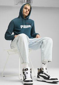 Puma Felpa con cappuccio - teal