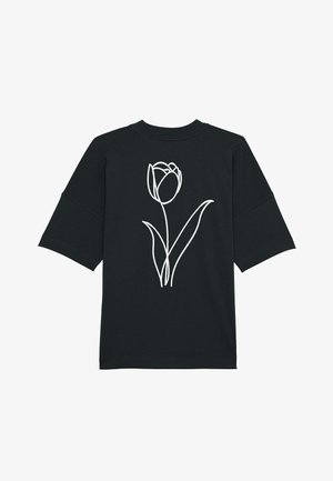 T-shirt noir à manches courtes avec un dessin en ligne blanche d'une tulipe au dos. Fabriqué en tissu léger et doux avec une coupe décontractée.
