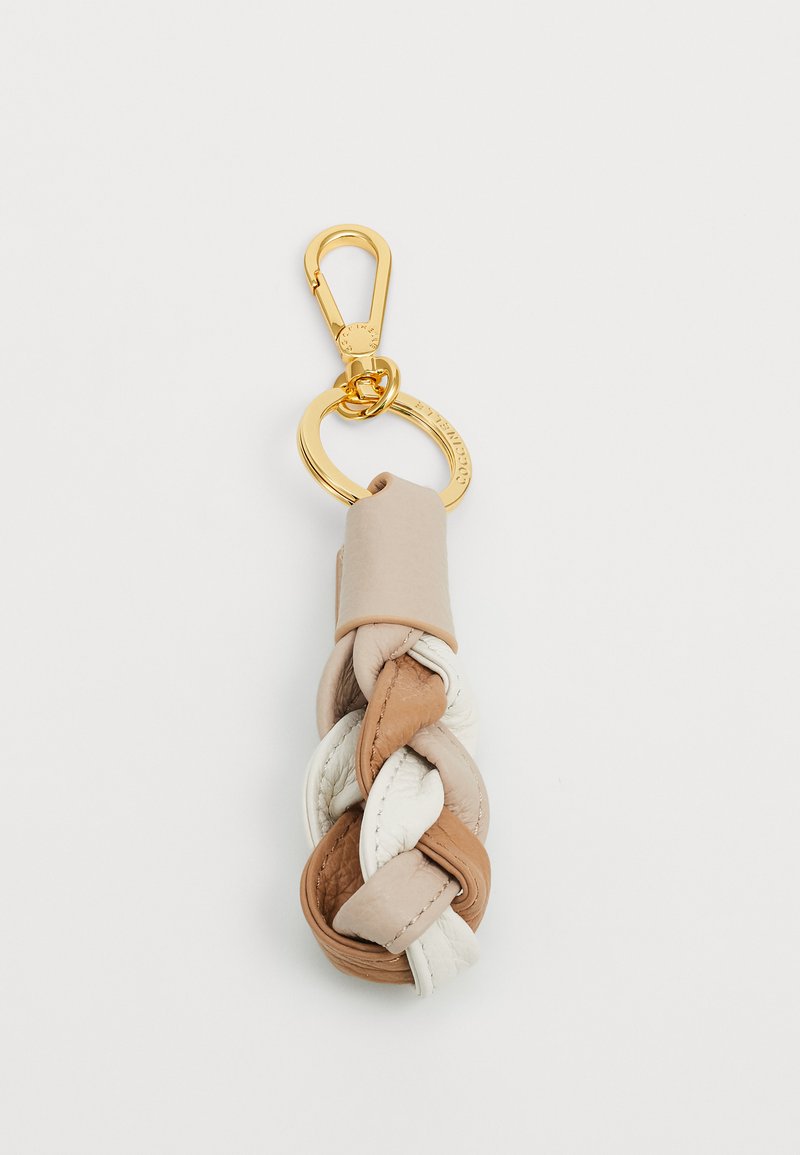 Porte-clés en cuir tressé beige, crème et marron clair. Doté d'un clip et d'un anneau en métal doré pour l'attache. Texture lisse.