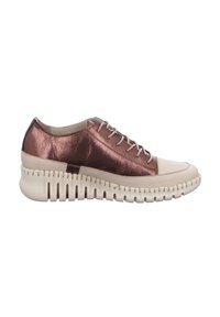 Sneakers with a metallic rose gold upper and a cream leather toe. Features a thick, ridged sole with vertical cutouts for added texture.