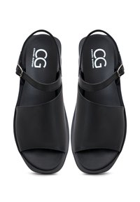Sandale din piele neagră cu vârf închis, curea ajustabilă pentru glezna, finisaj mat neted și un design minimalist.