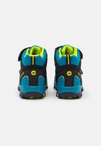Blue and black hiking boots with a padded collar, yellow accents, and velcro strap. Textured outsole designed for traction and stability.