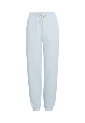 Svetlo modre trenirke iz mehke tkanine z vrvico za zategovanje v pasu, ovrnjeni gležnji in subtilnim vezenim logotipom spredaj.