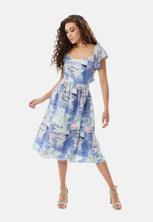 Floral-print midi dress in light blue and green, with ruffled short sleeves, a fitted waist, and a flowy, tiered skirt.