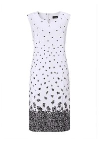 Weißes ärmelloses Kleid mit schwarzen Blumen- und Blattmustern, das über einen V-Ausschnitt verfügt und komplizierte schwarze Details am Saum aufweist.