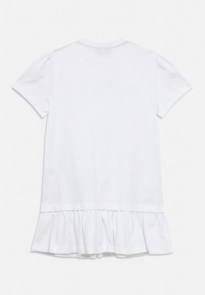 Robe blanche manches courtes avec un col rond et un large ourlet à volants en bas.