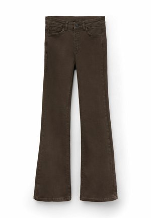 Bruna utsvängda jeans i denim. Har framfickor, dragkedja med knapp och sydda sömmar längs benen.